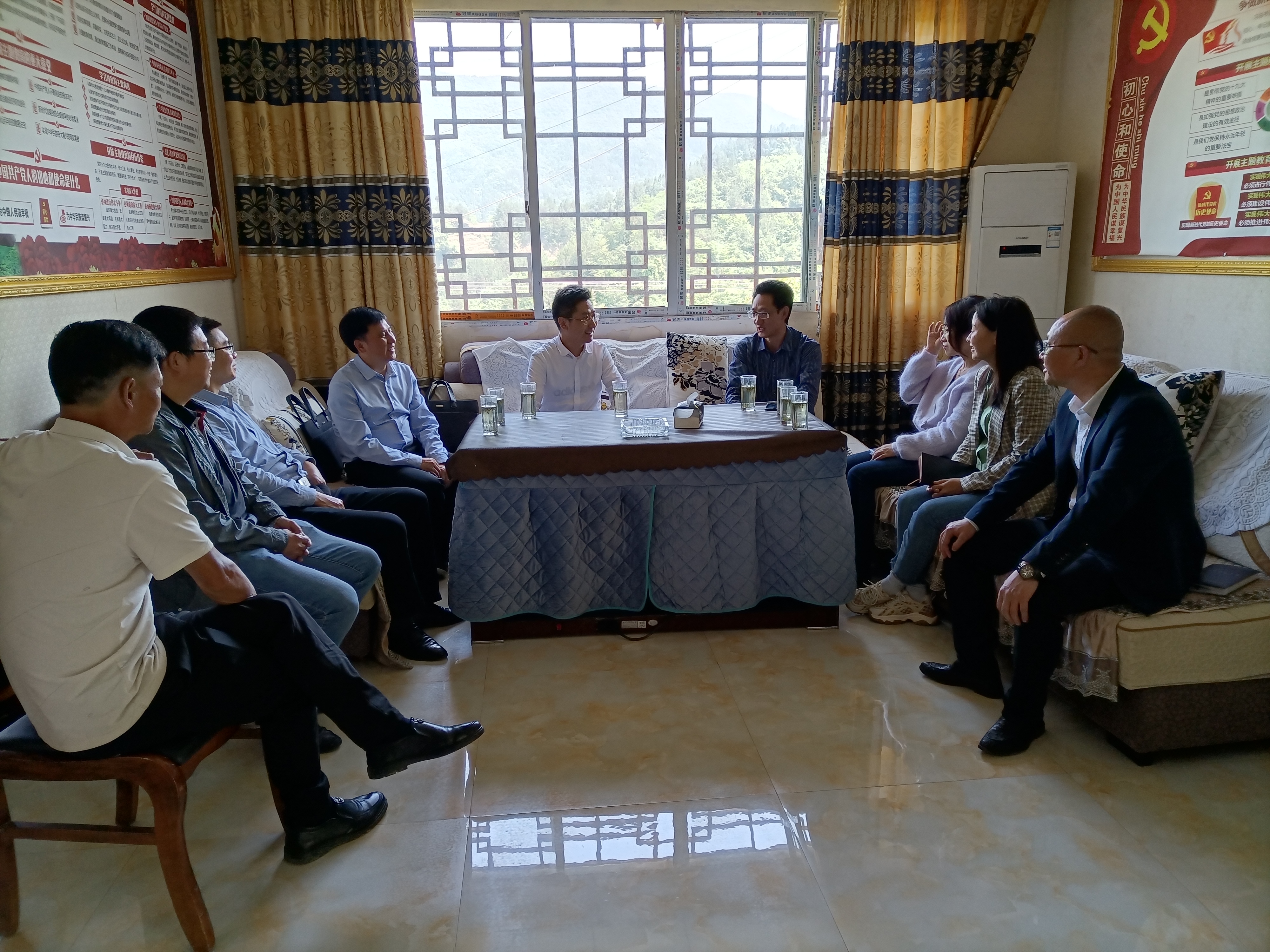 罗晓松局长一行与格林镇党委书记、镇长座谈.jpg